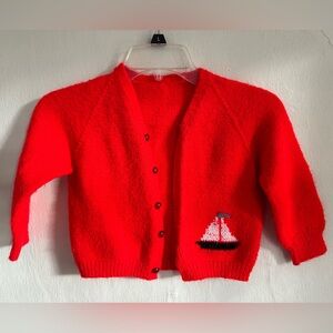 Red sailboat children’s crocheted sweater